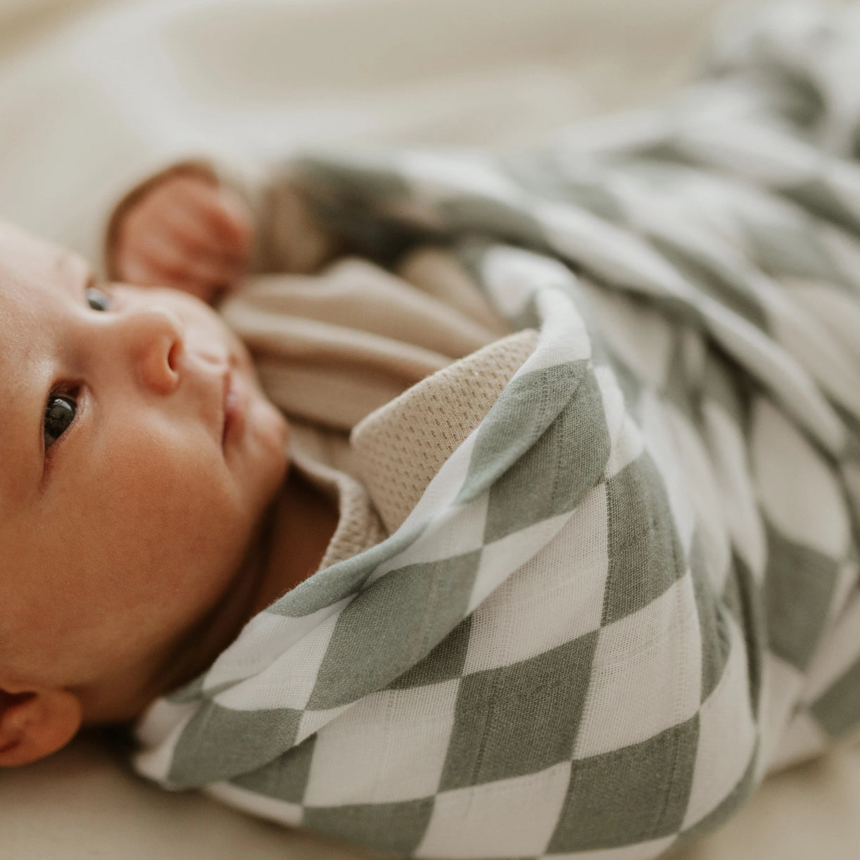 Snug as a Bub & Co moss chequered muslin baby swaddle image 1