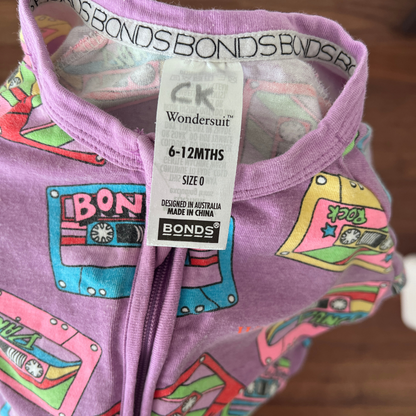 Bonds Wondersuit in cassette tape purple - size 0